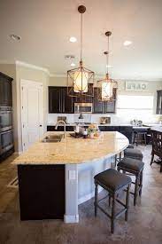 This island is part of our full house renovation. Curved Kitchen Island Black Wooden Bar Stools Island Countertop Tiled Floor Wooden Cabinets Curved Kitchen Curved Kitchen Island Kitchen Island With Sink