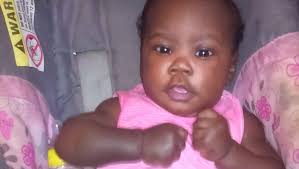 Police: Two men in custody in slaying of 6-month-old