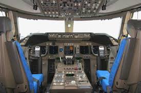 Coverspfd, nd, eicas, mcp, fms, and overhead panel. Boeing 747 400f Rocketroute