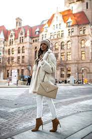 Fashion Blogger Mia Mia Mine Wearing An All White Winter Outfit With A Saint Laurent Envelope Trendy Outfits Winter Winter Coat Outfits Winter Fashion Outfits