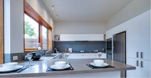 Modern australian kitchen design with stone bench top and contrasty colour scheme. Select The Perfect Kitchen Design For Your Lifestyle