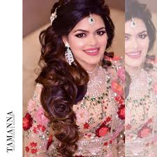 Gather your hair into a low side ponytail and create a fishtail braid. Wedding Hairstyle Ideas For Mehndi Sangeet Wedding Reception Bridal Look Wedding Blog