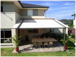Haymarket deck with dry space patio below. Awning Idea For Patio Behind Garage Patio Shade Patio Awning Ideas Patio Awning
