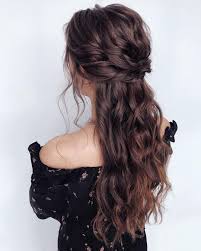 Similar to their onyx cousin, deep chocolate curls are extremely versatile we've covered half up, half down long curly hairstyles, but how about the different ways you can get them? Curly Wedding Hairstyles From Playful To Chic Wedding Forward
