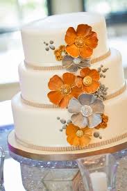 Orange And Gray Floral Wedding Cake By We Bake In Heels Dastan Studio Rubies And Ribbon Gray Wedding Cake Wedding Cakes With Flowers Orange Wedding Cake