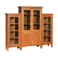 A common practice with simple furniture designs, like bookcases and dressers, is to extend the wall ends to the floor. 3 Piece Large Wall Unit Bookcase Vermont Woods Studios