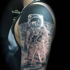Realism Bite The Bullet Tattoo 50 Best Tattoo Ideas In 2020 Tattoo Designs And Inspiration Tattoos For Guys Shoulder Armor Tattoo Outer Space Tattoos