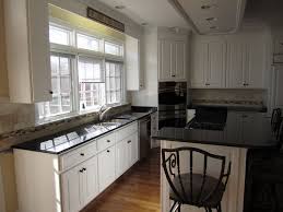 Tumbled Marble Back Splash Black Tiles Kitchen Black Granite Countertops Tile Countertops Kitchen
