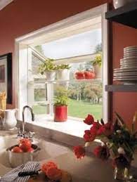 How do you make greenhouse windows? 18 Best Greenhouse Kitchen Window Ideas In 2021 Kitchen Window Greenhouse Kitchen Kitchen Garden Window