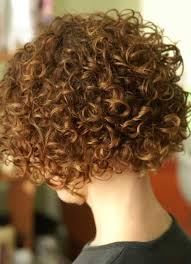 Curly hair can feel like a blessing and a curse. Short Permed Hairstyles African American Hair African American Magazine Short Permed Hair Short Curly Haircuts Curly Hair Styles