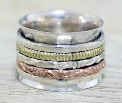 For the strong silent type: Spinning Wedding Bands The Handy Guide Before You Buy