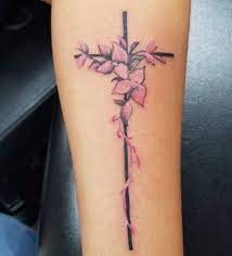 Cross with flowers inside tattoo. Pin On Tattoos