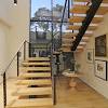 We offer the best custom stair treads, iron balusters, and wood stair railing. 3