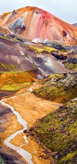 16 Reasons Why You Must Visit Iceland Right Now Amazing No 12 Amongraf Iceland Travel Colorful Mountains Visit Iceland