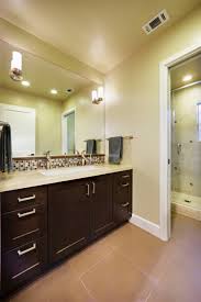 The photos are great but the stories are even better especially for bathroom decoration. 75 Beautiful Brown Tile Bathroom With Yellow Walls Pictures Ideas April 2021 Houzz
