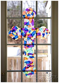 Here's a video showing tissue paper stained glass suncatchers in action! Stained Glass Looking Tissue Paper Easter Cross Kids Craft