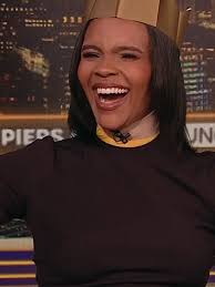 Candace Owens Tries Christmas Crackers with Piers Morgan