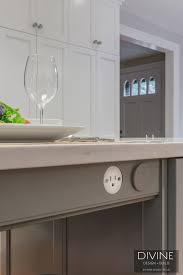 If installed in the side of the island cabinet, it can be no lower than 12 inches below the countertop surface. Options For Hiding Kitchen Outlets Divine Design Build