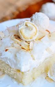 Raffaello Poke Cake Coconut Cake With White Chocolate Coconut Cream Whipped Cream Coconut Recipes Whipped Topping Recipe Dessert Smoothie