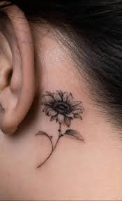 Cherry blossom, flower, rose on her hip. 37 Pretty Ear Tattoo Design Ideas For Woman 2021 Cozy Living
