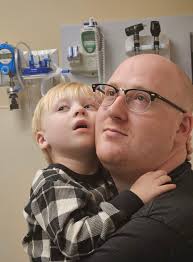 Can someone edit Dr. Manhattan to look like an emo kid from the early  2000's?