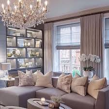 Bookshelf Next To The Window And 2 Chair And A Table Sitting Area Behind The Couch Elegant Living Room Decor Elegant Family Room Living Room Decor Colors
