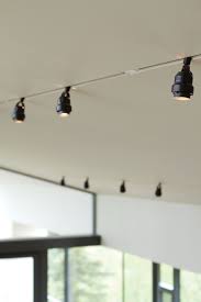 Photo 9 Of 10 In An Epic Plot Track Lighting Living Room Lighting Modern Track Lighting