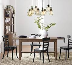Dining room pendant lights come in all sorts of shapes, colors and styles. Paxton Glass 8 Multi Light Pendant Pottery Barn