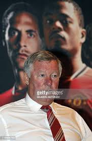 Romona Johnson plays in a fountain at the Inner Harbor with her... News  Photo