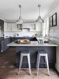 What are the colors of colombe kitchen cabinets? Contemporary White And Gray Kitchen With Two Tone Cabinets White Upper Cabinets And Kitchen Trends Kitchen Design Home Kitchens