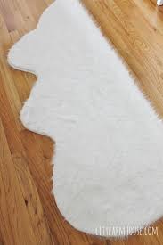 Prided for their large size and rarity these rugs are a truly exquisite addition to our polar bear rugs are the rarest and largest of all of our bear skin rugs. Easy Diy Faux Fur Rug Fa La La Free Printable City Farmhouse