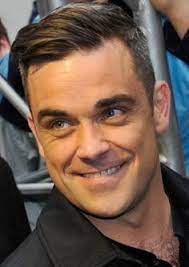 Robbie Williams Proudly Shows Off His Grey Hair Google Search Robbie Williams Robbie Williams Take That Robbie