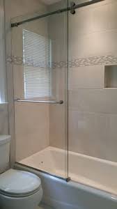 The layout has two separate sinks along different walls, allowing each person to have their space for toiletries. Glass Door Bathtub Ideas Photos Houzz