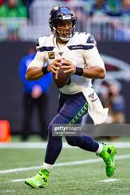 Russell Wilson Of The Seattle Seahawks Looks To Pass During The First Seahawks Seattle Seahawks Wilson Seahawks