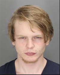 Charges issued in slaying of 2 Highland Twp. victims found dead near pond