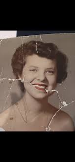 I love this photo of my granddaughter. Can anyone help with removing people  from the background?