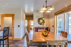 A dining room is a room for consuming food. Informal Dining Area Adjacent To Kitchen Stock Photo Picture And Royalty Free Image Image 148760381
