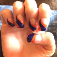 Acrylic nails are nail enhancements made by combining a liquid acrylic product with a powdered acrylic product, according to nails magazine. Blue And Orange Acrylic Nails New Expression Nails