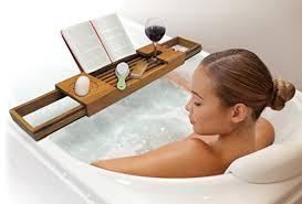 If you live with others, including children or a partner, then you will also find that the space becomes cluttered. Teak Bathtub Tray 6 Best Bathtub Caddies To Relax And Enjoy The Bath