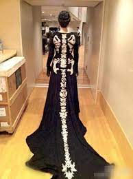 An Evening Gown With Dragon Bones Running Down Its Back Skeleton Dress Dresses Fashion