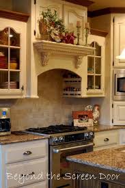 French Country Kitchen Design Ideas And Decor Love The Above Stove Cabinets With Spice Storage Country Kitchen French Country Kitchens Country Kitchen Designs