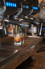 The large, decorative espresso machine made of brass is said to have cost more than 1000 dollars. Espresso Machine Espresso Machine Espresso Machines Machine Photo