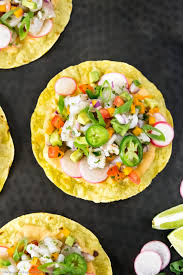 Cool and tasty shrimp ceviche recipe, shrimp served with chopped red onion, chile, cilantro, cucumber, avocado with lemon and lime juices. Mexican Shrimp Ceviche Tostadas No Spoon Necessary