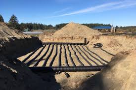 I've poked around the internet for a hybrid greenhouse that uses both geothermal and a climate battery, but cannot find any that have adopted both means of heating. Here Is A Quick Peek At The Manifold And One Of The Layers Of Heat Transfer Pipe Beneath The Geothermal Greenhouse In The Early Construction Phase Greenhouses