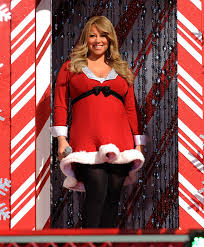 The singer wrote in her memoir, the meaning of mariah carey, that before meeting cannon, she had no interest in being a mother. Pregnant Mariah Carey Shows Baby Bump In Santa Dress Photos Huffpost