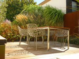 Jorg Kaspari Landschaftsarchitekt Blick Durch Die Graserhecke Zum Sitzplatz Sitzplatz Terrasse Deck Gartendekor Outdoor Dekorationen Gartenmobel Sets