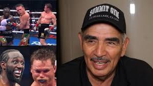 Coach Norman working with Jonathan Badillo