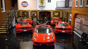 600 000 man cave features ferrari parked next to sofa man cave design man cave garage ultimate man cave