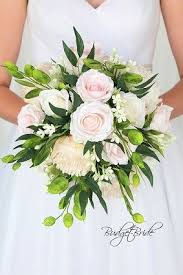 Light Pink And Blush Brides Bouquet With Peonies And Roses Accented With Greenery In Silver Doll Wedding Bouquets Pink Bride Bouquet Pink Bridal Bouquet Spring