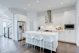 Bright All White Kitchen With Quartz Countertops And Spacious Pantries At Edgewood Trendy Kitchen Tile Kitchen Cabinets Painted Grey Stained Kitchen Cabinets